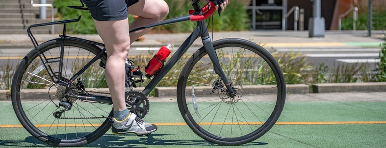 A person on a bike, preparing to cycle