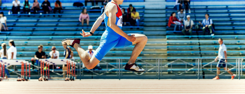 A triple jumper mid-jump