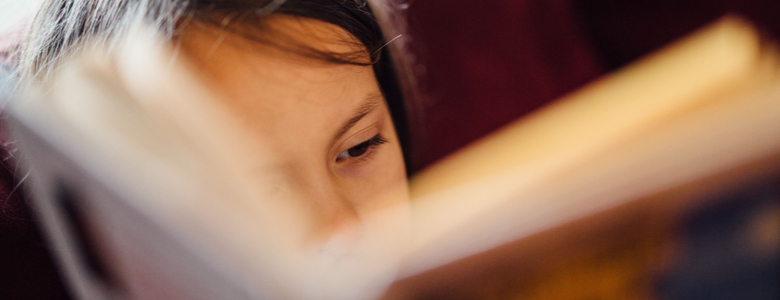 A child engrossed in a book