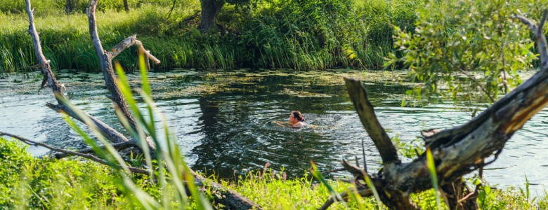 A woman wild swimming