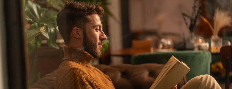 A man reading a book.