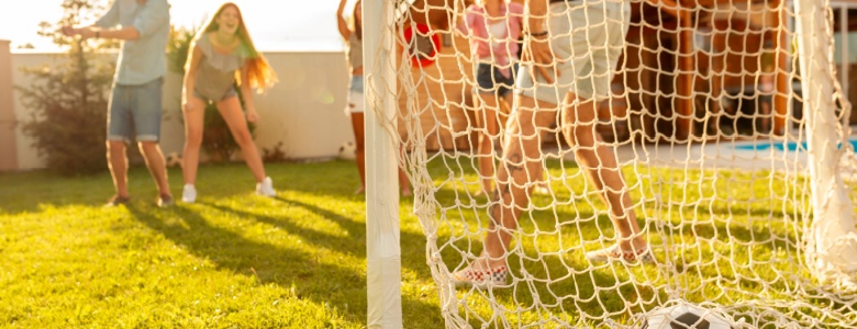 A family playing football.