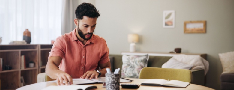 A man reviewing paperwork.
